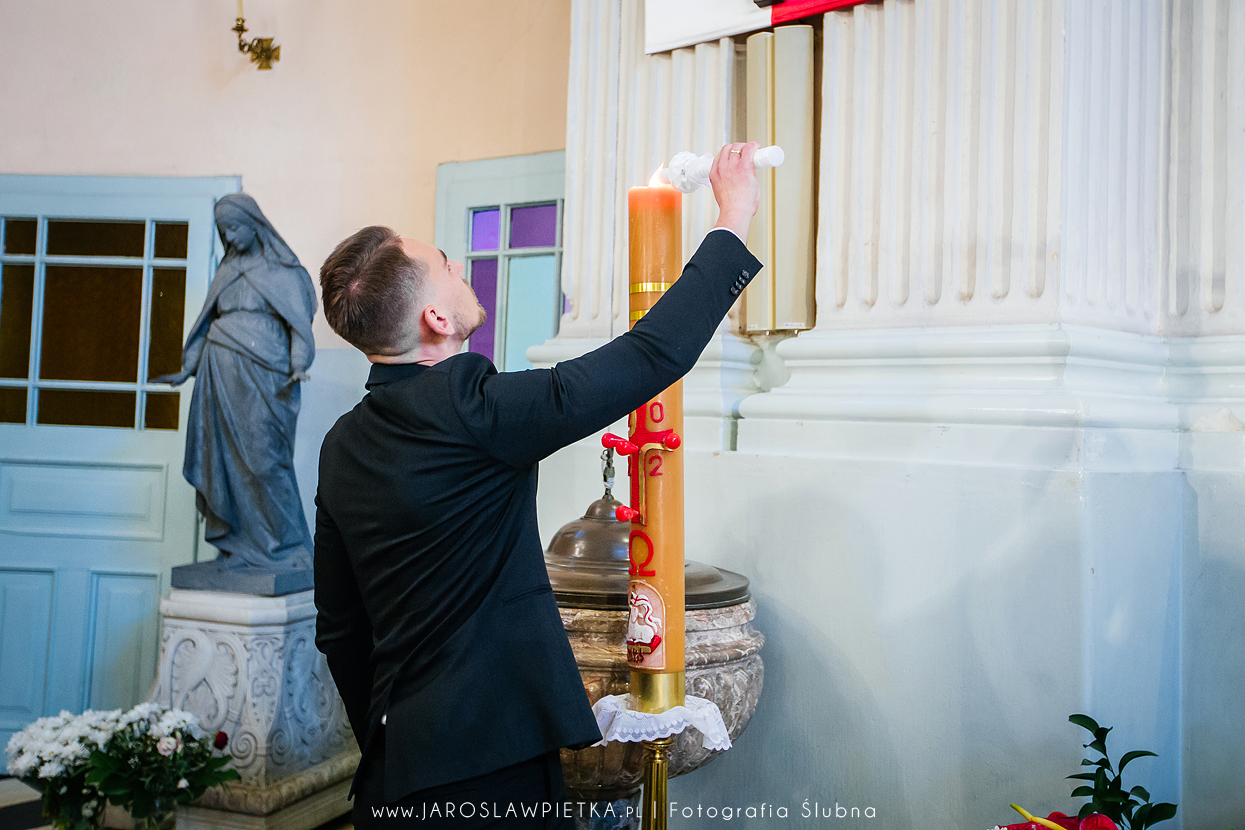 Zapalanie świecu _ Zdjęcia z chrztu świętego Otwock